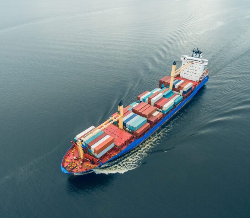 Container vessel sailing in open sea
