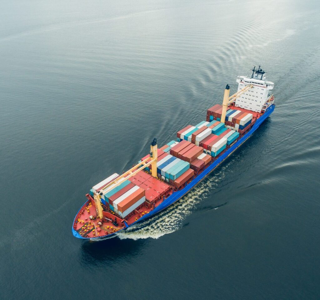 Container vessel sailing in open sea
